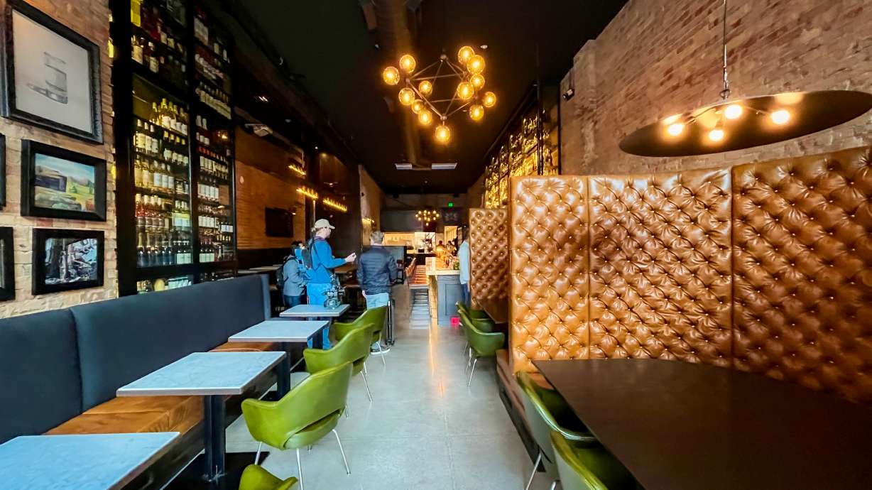 The White Horse Spirits & Kitchen in downtown Salt Lake City on Thursday, minutes before it officially reopened for the first time since a fire in August 2025. It's the first business to reopen among the five most impacted by the blaze.