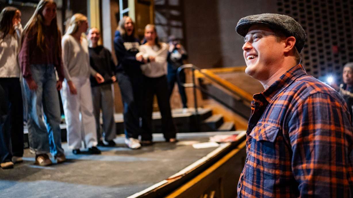 Lucas Grabeel, who played Ryan Evans in "High School Musical," surprises students rehearsing their production of “High School Musical” at East High School in Salt Lake City, Thursday. This year marks the 20th anniversary of the movie’s premiere.