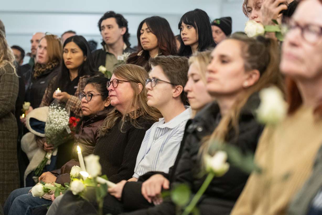 People listen to a speaker during a vigil held for Alex Pretti at the Capitol in Salt Lake City on Thursday, Jan. 29, 2026.