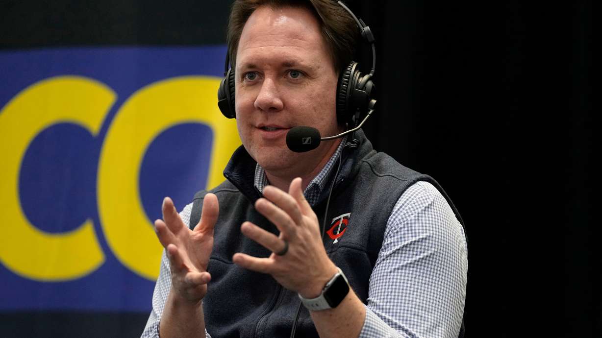FILE - Minnesota Twins president of baseball operations Derek Falvey speaks to fans and media during the baseball team's annual fan fest at Target Field, Jan. 28, 2023, in Minneapolis.