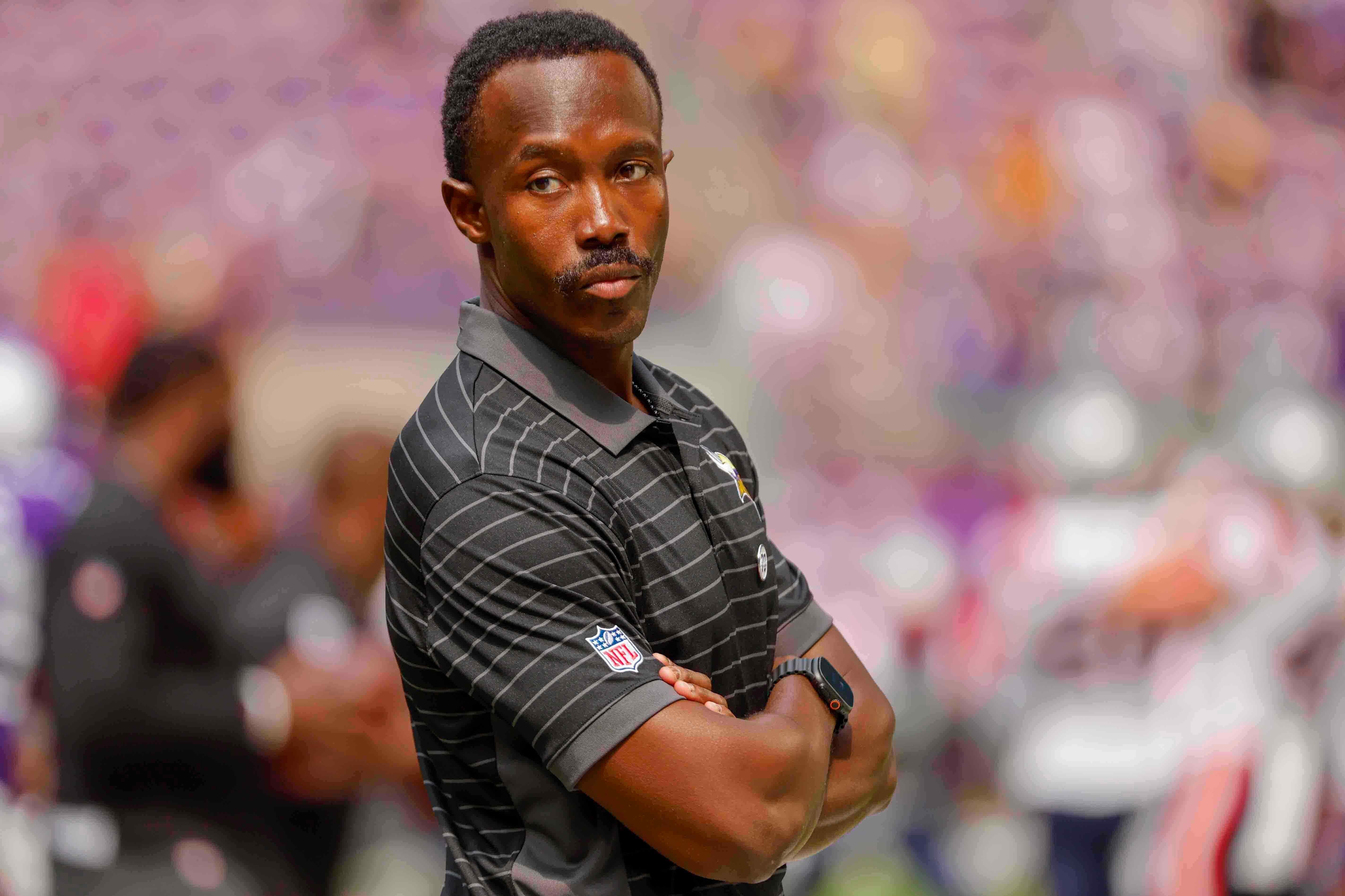 FILE - Minnesota Vikings general manager Kwesi Adofo-Mensah watches his team prepare before the start of a preseason NFL football game against the New England Patriots Saturday, Aug. 16, 2025, in Minneapolis. 