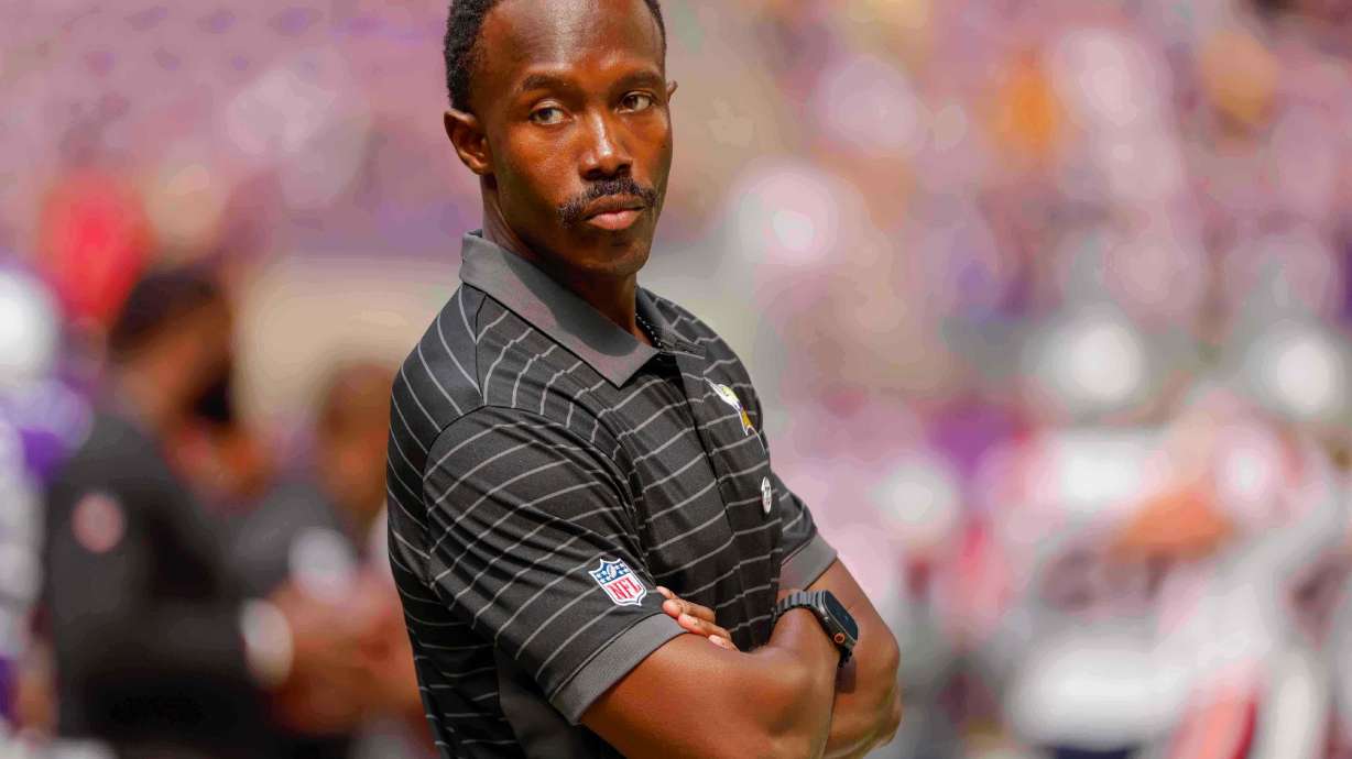 FILE - Minnesota Vikings general manager Kwesi Adofo-Mensah watches his team prepare before the start of a preseason NFL football game against the New England Patriots Saturday, Aug. 16, 2025, in Minneapolis.