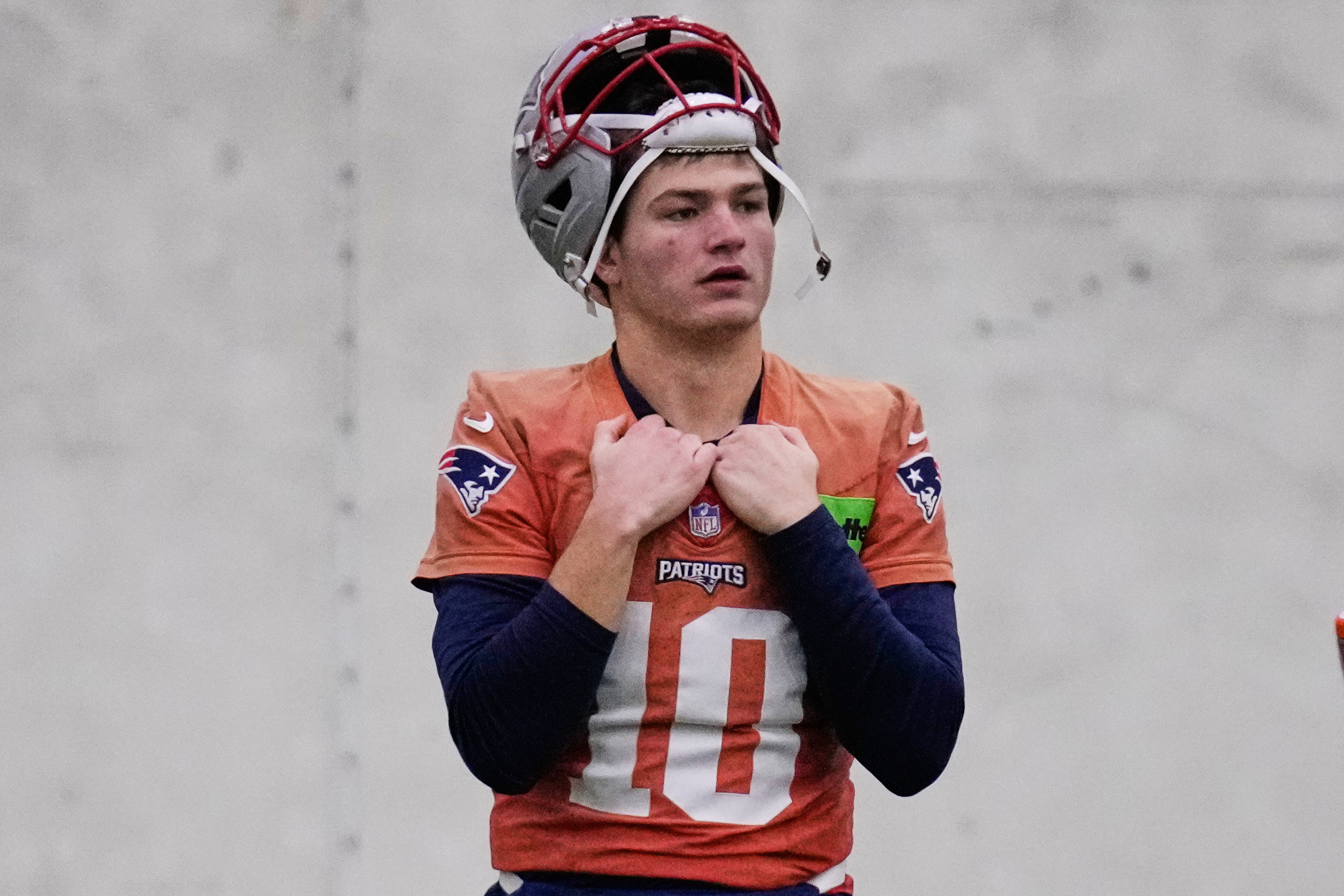 New England Patriots quarterback Drake Maye watches teammates during an NFL football availability, Thursday, Jan. 29, 2026, in Foxborough, Mass. 