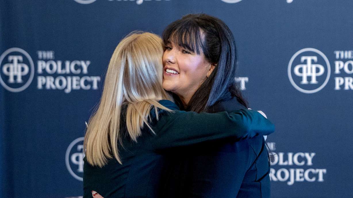 Sen. Heidi Balderree, R-Saratoga Springs, right, hugs Emily Bell McCormick, founder and president of The Policy Project, at the Capitol in Salt Lake City on Thursday. A bipartisan group of state lawmakers participated in an event to share how raising a family can be more affordable.