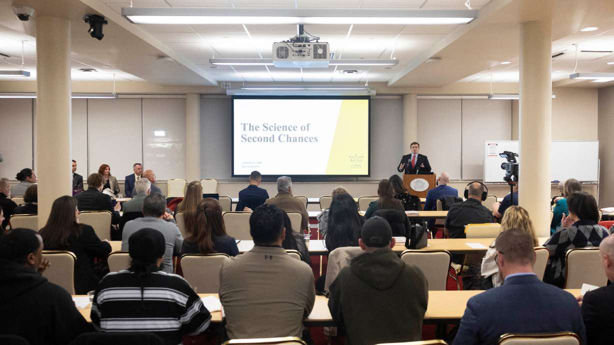 Rep. Tyler Clancy, R-Provo, welcomes attendees during the Utah Crime Summit keynote address at the Thomas S. Monson Center in Salt Lake City on Tuesday, Jan. 27.
