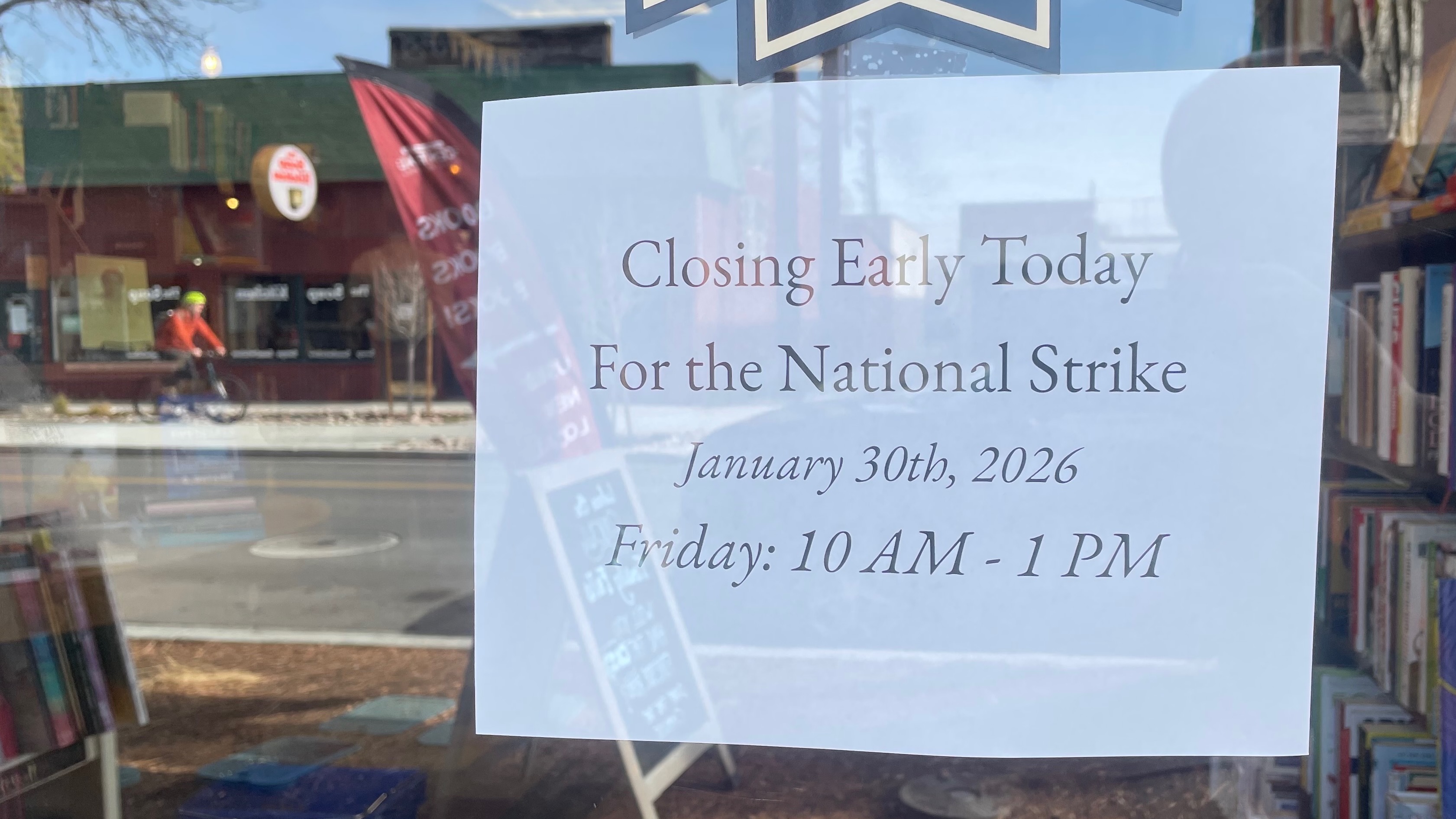 Utah high school students walked out of class, people demonstrated in Salt Lake City and some businesses closed early on Friday to protest the federal immigration crackdown. The sign was on the door at Central Book Exchange in Salt Lake City.