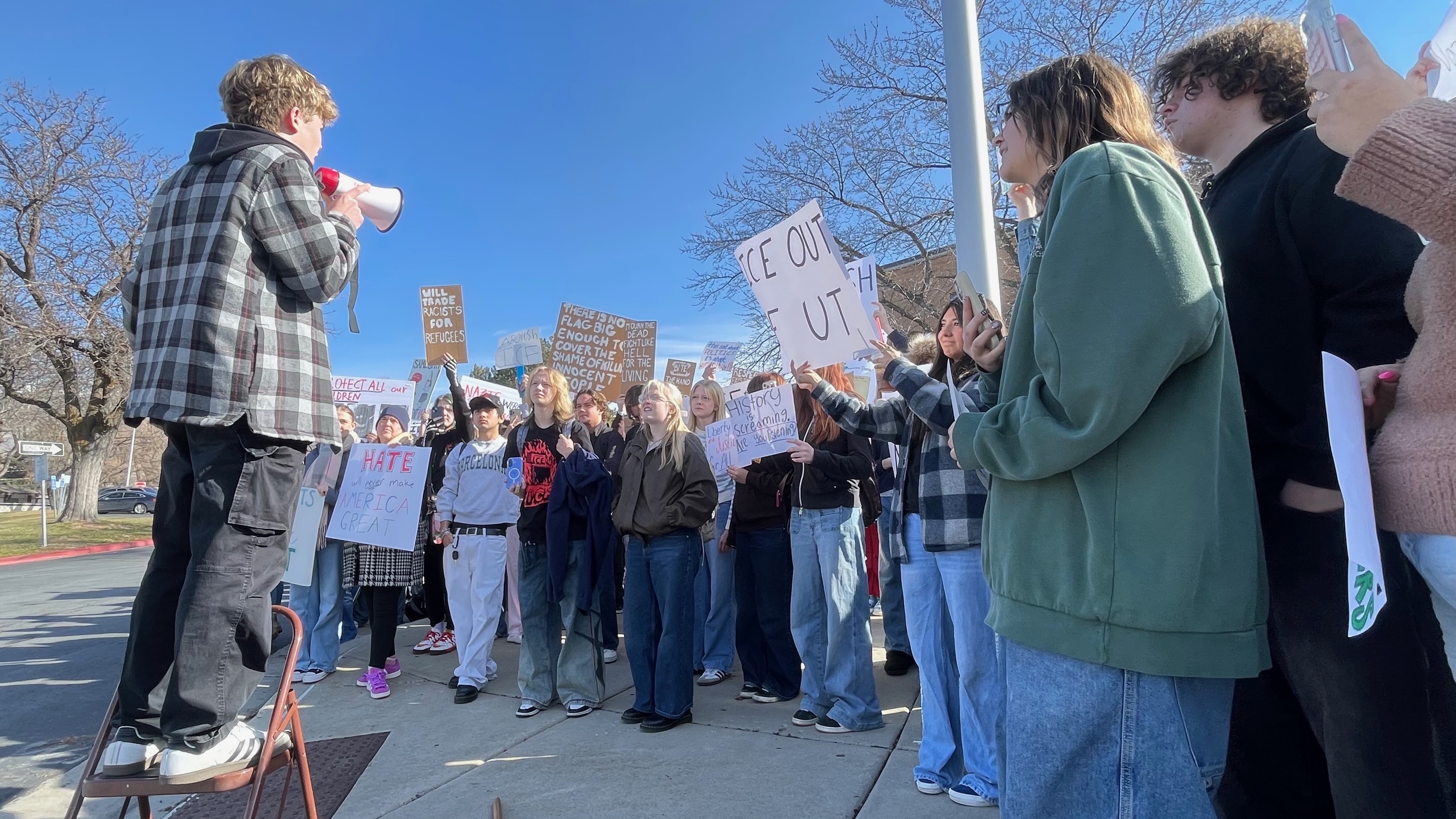 Students at Bountiful High School, pictured here, walked out of class, people demonstrated in Salt Lake City and some businesses closed early on Friday to protest the federal immigration crackdown.