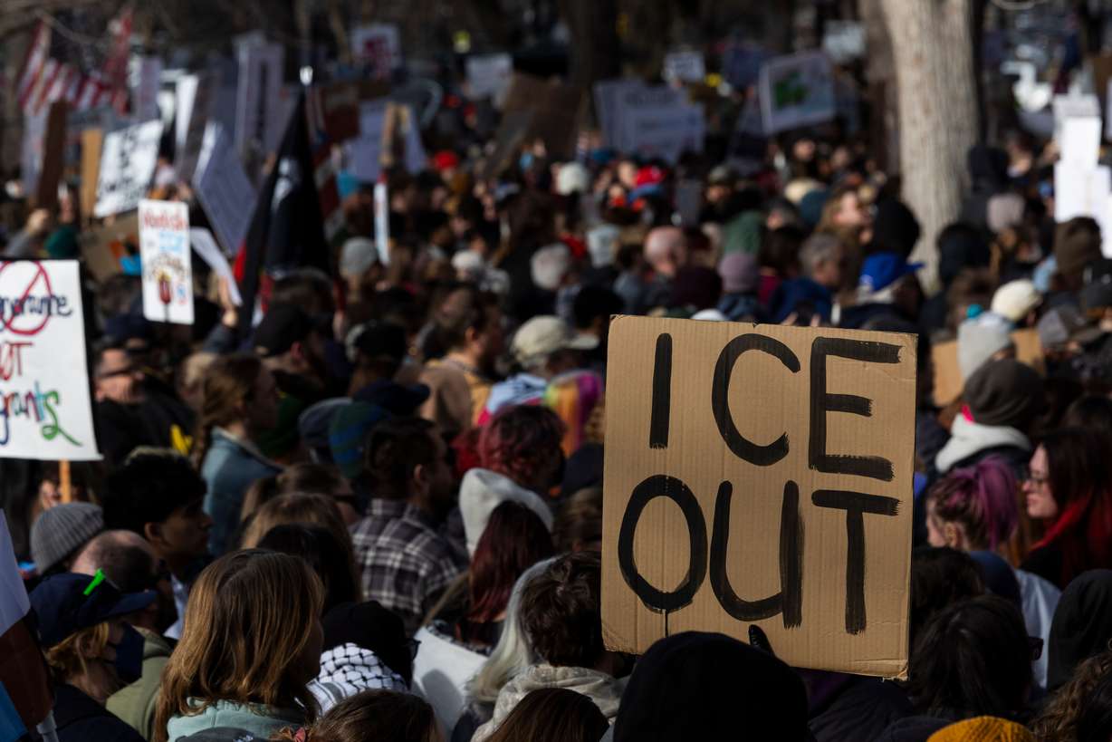 Thousands of people attend an anti-ICE protest at Washington Square Park in Salt Lake City on Friday.