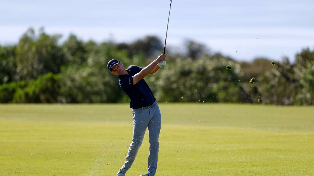 Justin Rose, of England, hits from the 17th fairway while playing the South Course at Torrey Pines during the second round of the Farmers Insurance Open golf tournament Friday, Jan. 30, 2026, in San Diego.