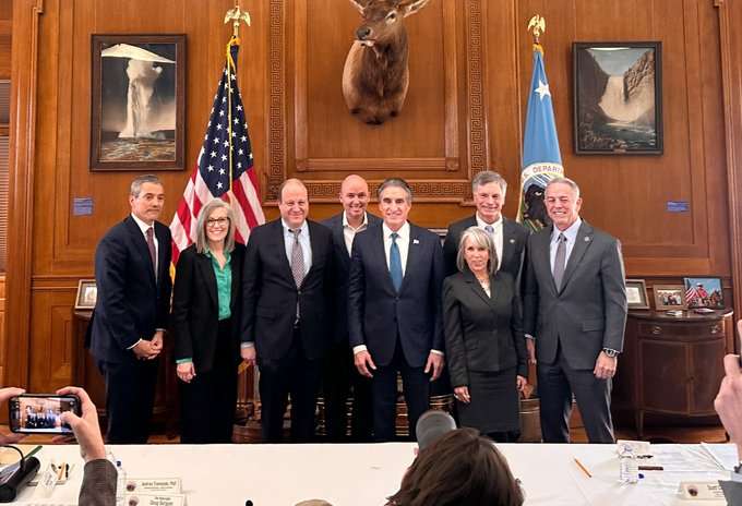 Leaders of the Colorado River Basin states pose for a photo with Interior Secretary Doug Burgum on Friday. The seven states met in Washington, D.C., to discuss a new Colorado River deal.