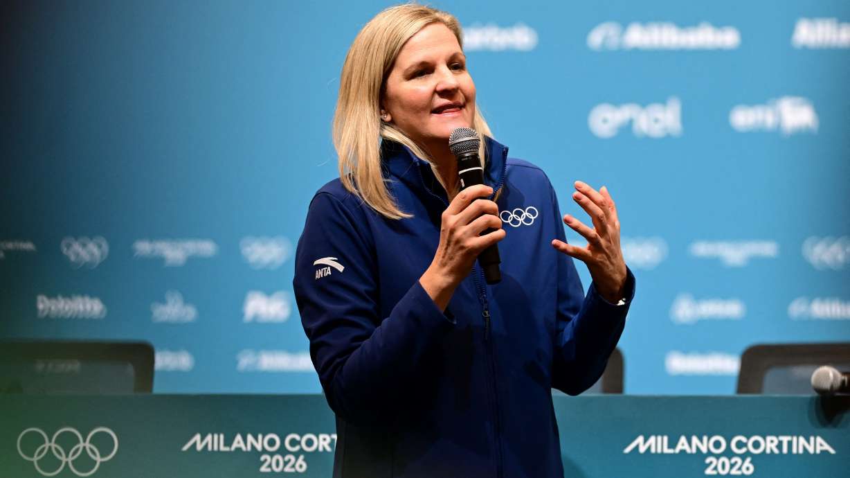 IOC President Kirsty Coventry speaks to volunteers, ahead of the 2026 Winter Olympics, in Milan, Italy, Thursday, Jan. 29, 2026.