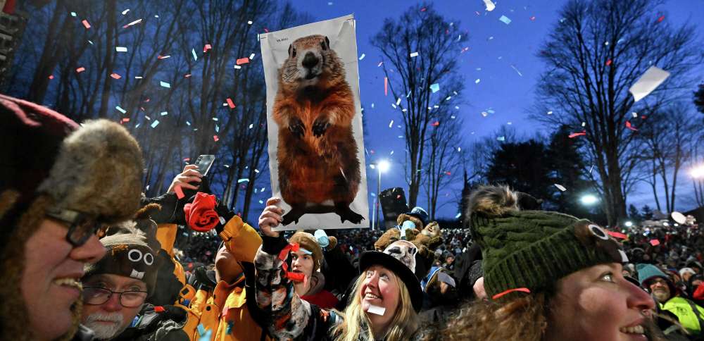 Punxsutawney Phil prepares to issue his Groundhog Day weather verdict from Gobbler's Knob