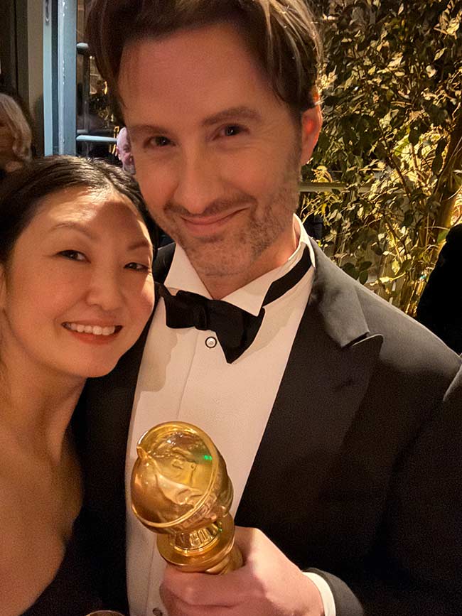 Chris Appelhans, right, with his wife, Maurene Goo, holding his Golden Globe award. The filmmaker from Idaho Falls makes up half the writing and directing team for Netflix's "most-watched original title."