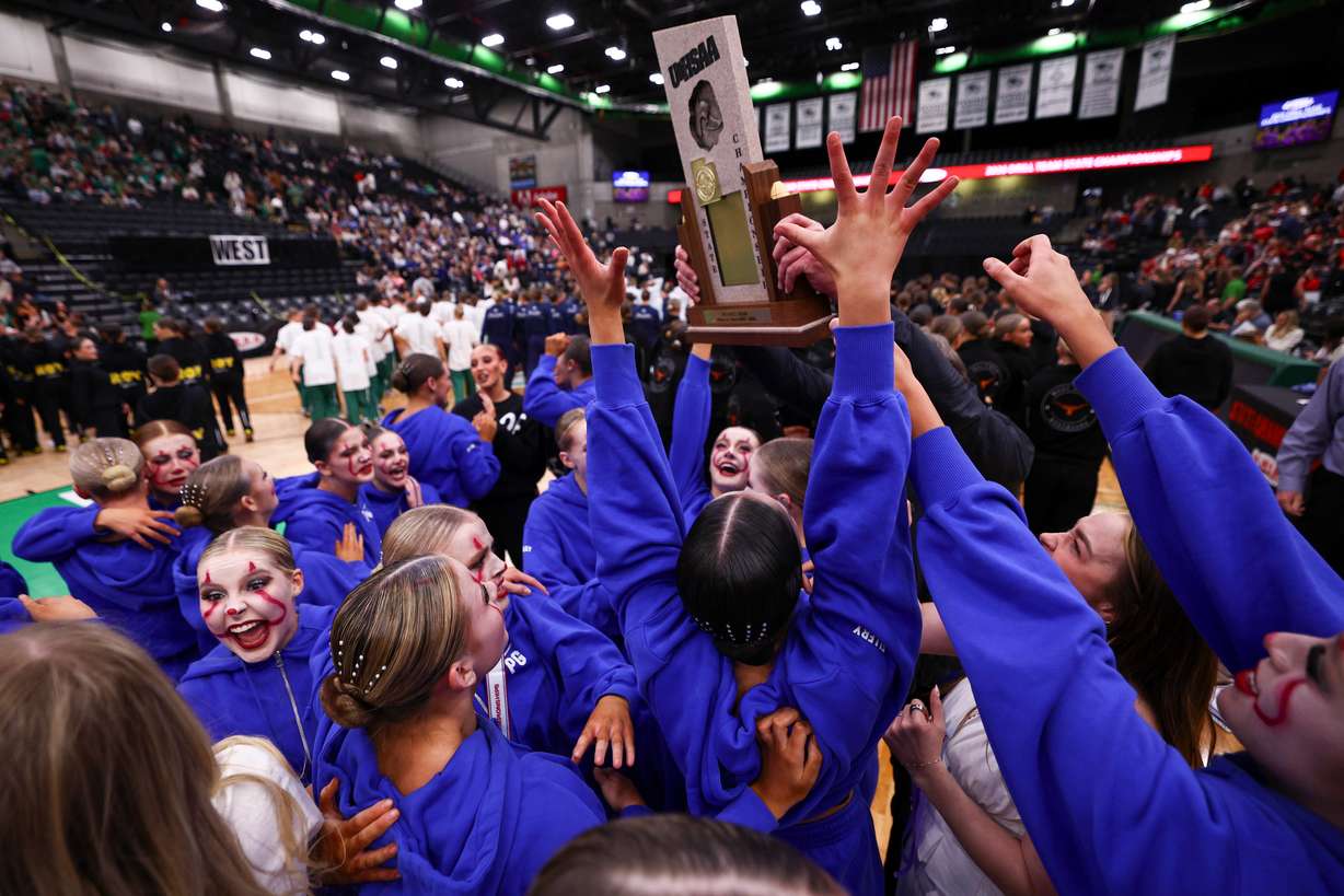 The Pleasant Grove Vikettes celebrate after winning the overall 2026 5A team drill championship at the UCCU Center in Orem on Saturday, Jan. 31, 2026.