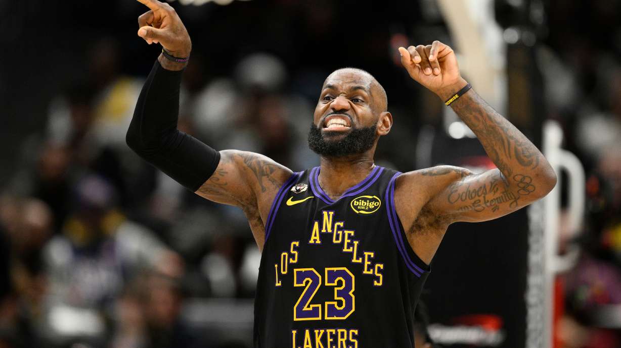 Los Angeles Lakers forward LeBron James gestures during the first half of an NBA basketball game against the Washington Wizards, Friday, Jan. 30, 2026, in Washington.
