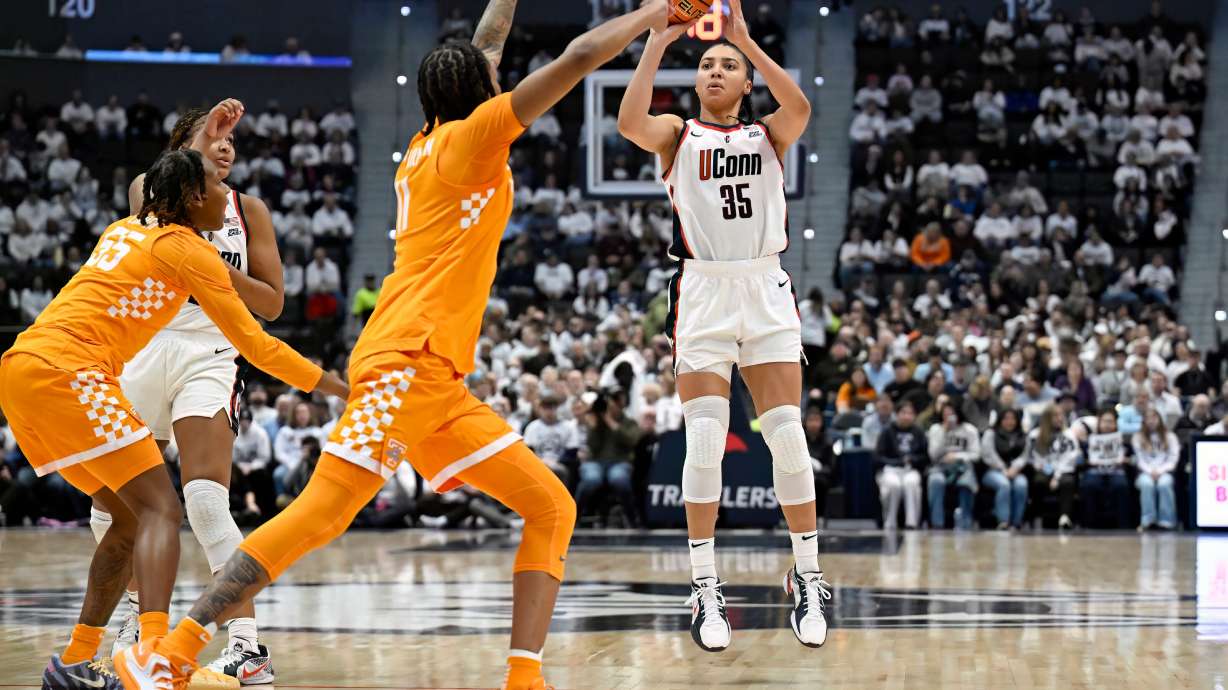 UConn guard Azzi Fudd (35) shoots in the first half of an NCAA college basketball game against Tennessee, Sunday, Feb. 1, 2026, in Hartford, Conn.