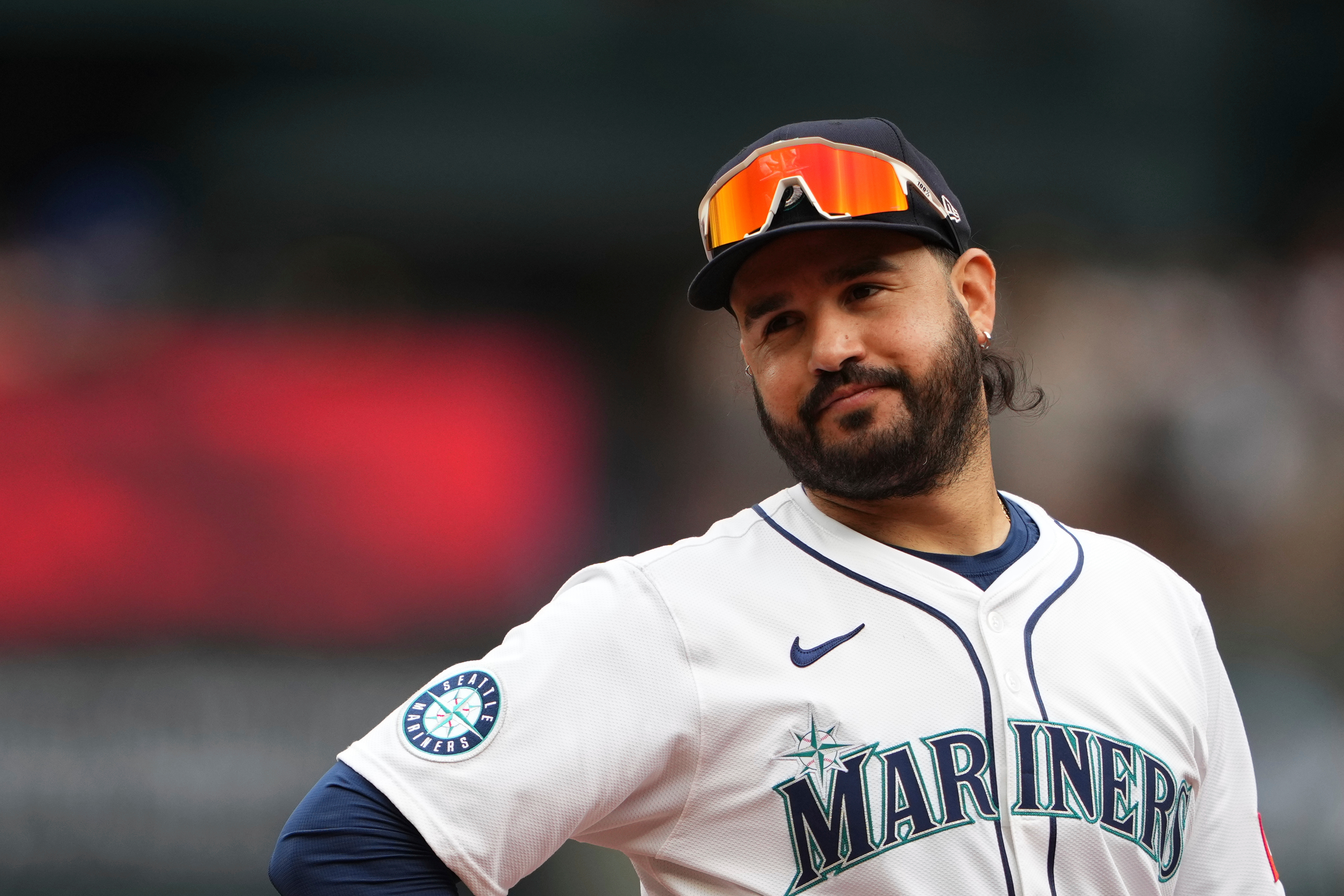FILE - Seattle Mariners third baseman Eugenio Suarez looks on during a baseball game against the San Diego Padres, Aug. 27, 2025, in Seattle. 