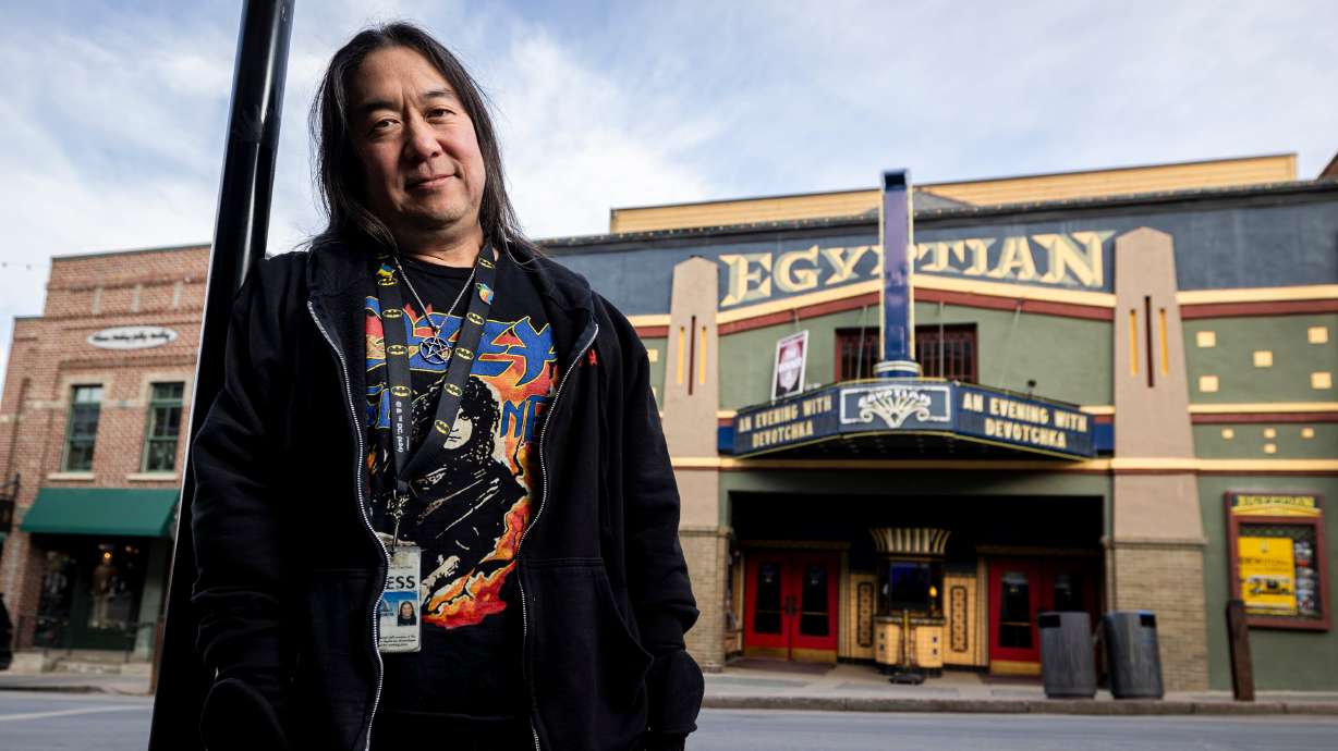Scott Iwasaki, scene editor at The Park Record who has covered the Sundance Film Festival for 30 years, poses for a portrait outside the Egyptian Theatre along Main Street in Park City on Jan. 20,.