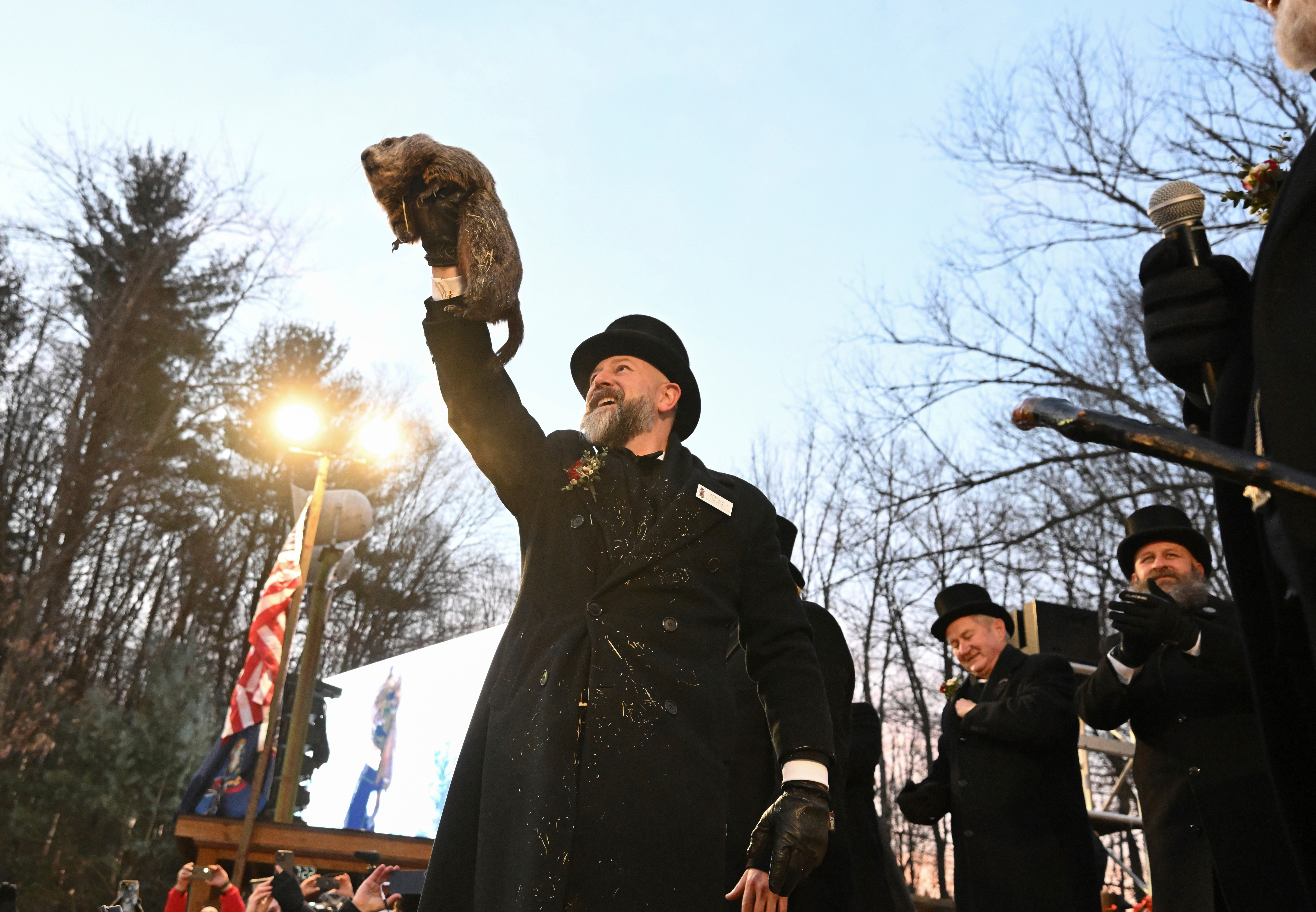 Groundhog Club handler A.J. Dereume holds Punxsutawney Phil, the weather prognosticating groundhog, during the 139th celebration of Groundhog Day on Gobbler's Knob in Punxsutawney, Pa., Feb. 2, 2025. 