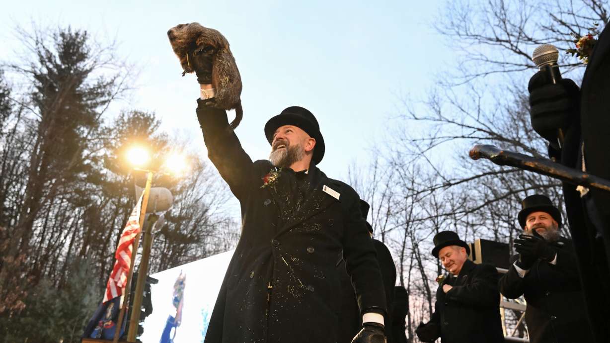 Groundhog Club handler A.J. Dereume holds Punxsutawney Phil, the weather prognosticating groundhog, during the 139th celebration of Groundhog Day on Gobbler's Knob in Punxsutawney, Pa., Feb. 2, 2025.