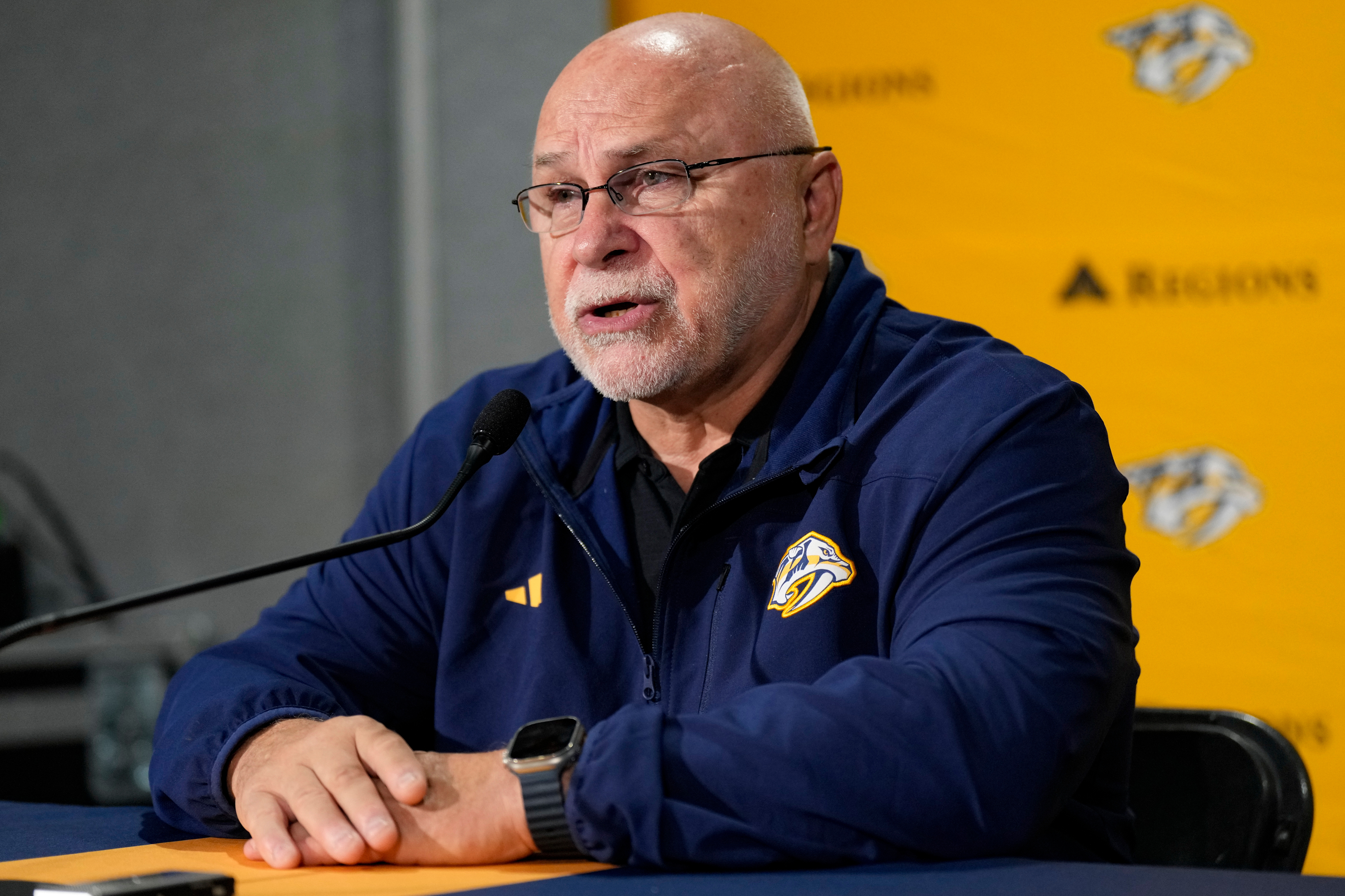 FILE - Nashville Predators general manager Barry Trotz responds to questions during a news conference at the team's NHL hockey training camp Sept. 19, 2024, in Nashville, Tenn. 