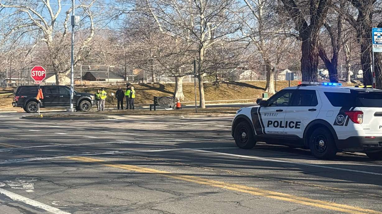 A woman is in "extremely critical" condition after being hit by a truck Monday while walking in a crosswalk at the 1500 East and 1300 South intersection, police said.