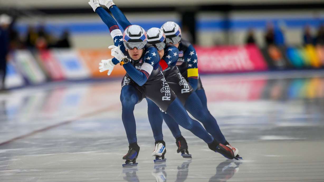 FILE - From front to back, United States' Casey Dawson, Emery Lehman and Ethan Cepuran skate to a new world record during the men's team pursuit at a World Cup speedskating event, Nov. 16, 2025, in Salt Lake City.