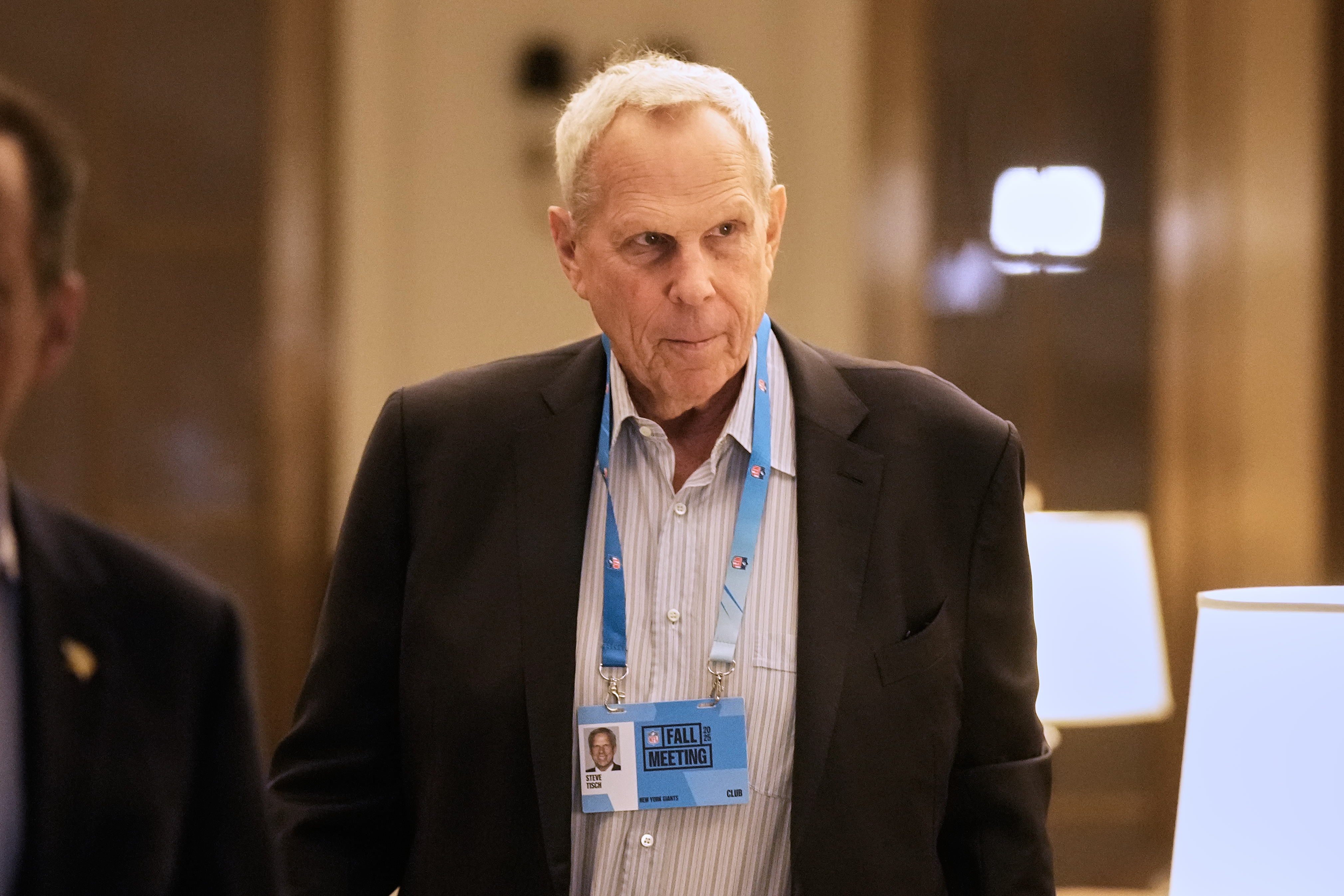 FILE - New York Giants co-owner Steve Tisch arrives for NFL owners meetings, in New York, Wednesday, Oct. 22, 2025. 