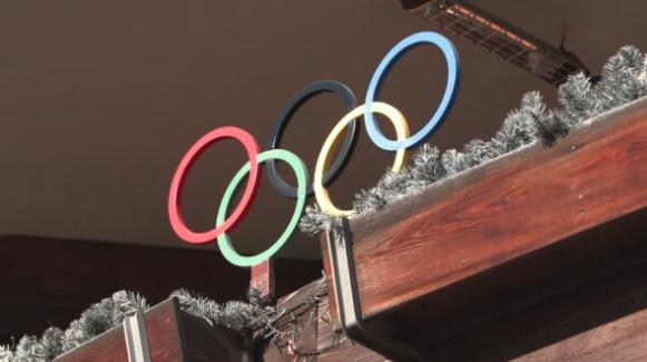 Olympic rings adorn a balcony in Cortina d’Ampezzo’s city center, Corso Italia.