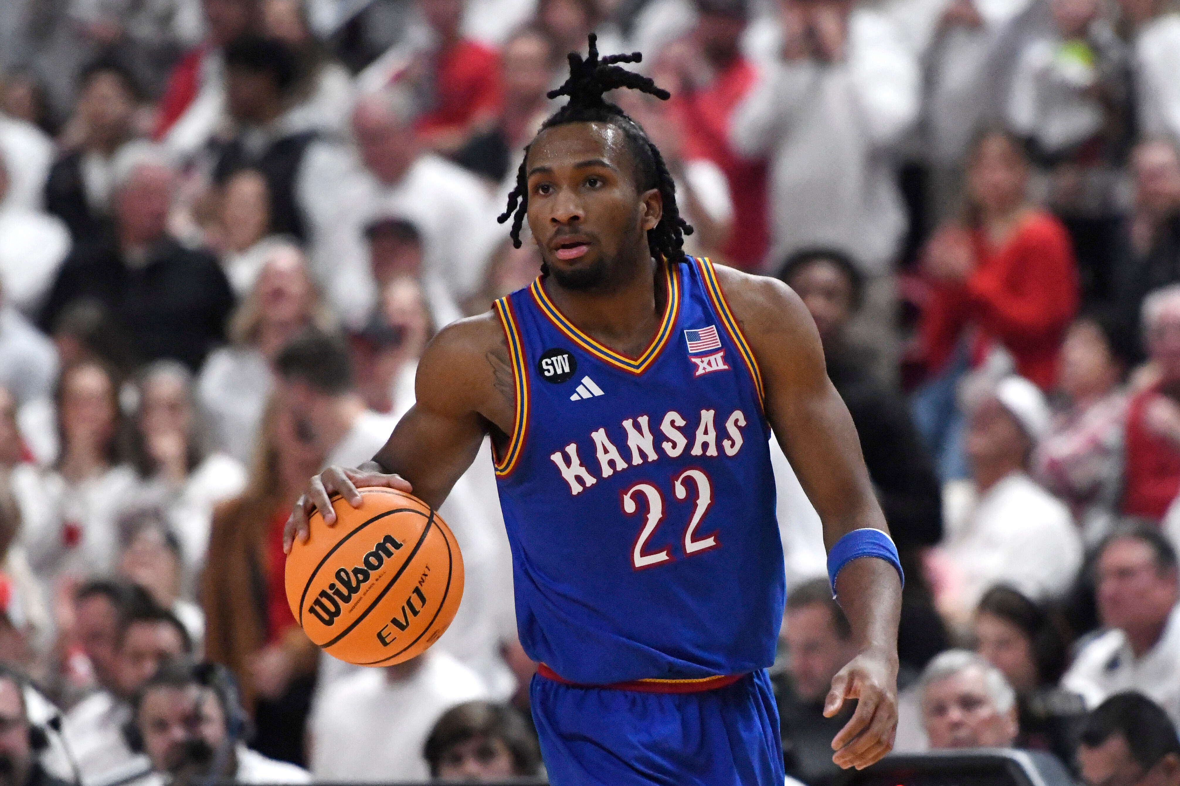 Darryn Peterson hits two late 3s as No. 11 Kansas wins 64-61 at No. 13 Texas Tech