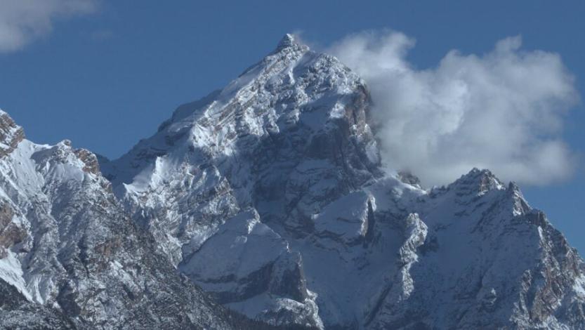 Snow-dusted Dolomite peaks rise above Cortina.