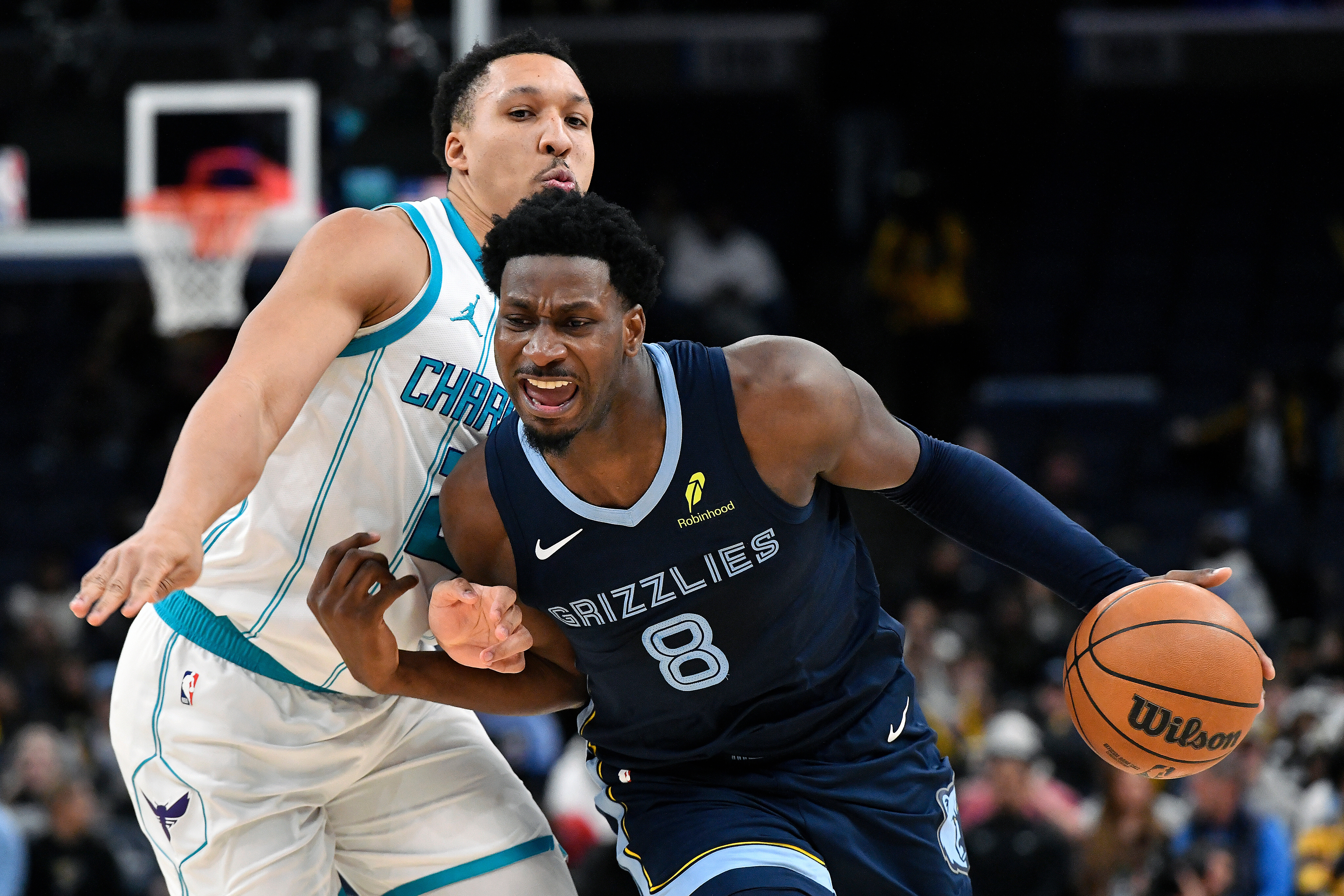 Memphis Grizzlies forward Jaren Jackson Jr. (8) handles the ball against Charlotte Hornets forward Grant Williams (2) in the second half of an NBA basketball game Wednesday, Jan. 28, 2026, in Memphis, Tenn. 