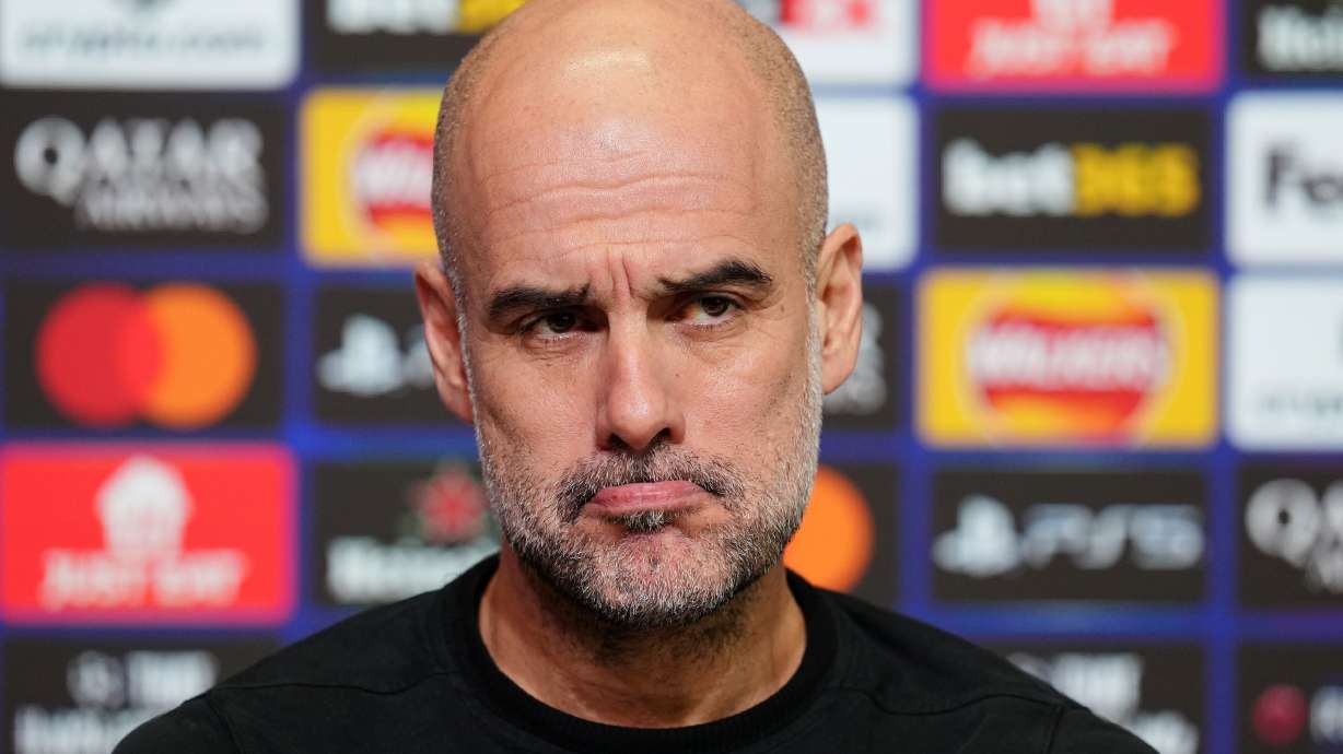 Manchester City manager Pep Guardiola looks on during a press conference in Manchester, England, Tuesday Jan. 27, 2026, one day ahead of their Champions League soccer match against Galatasaray.
