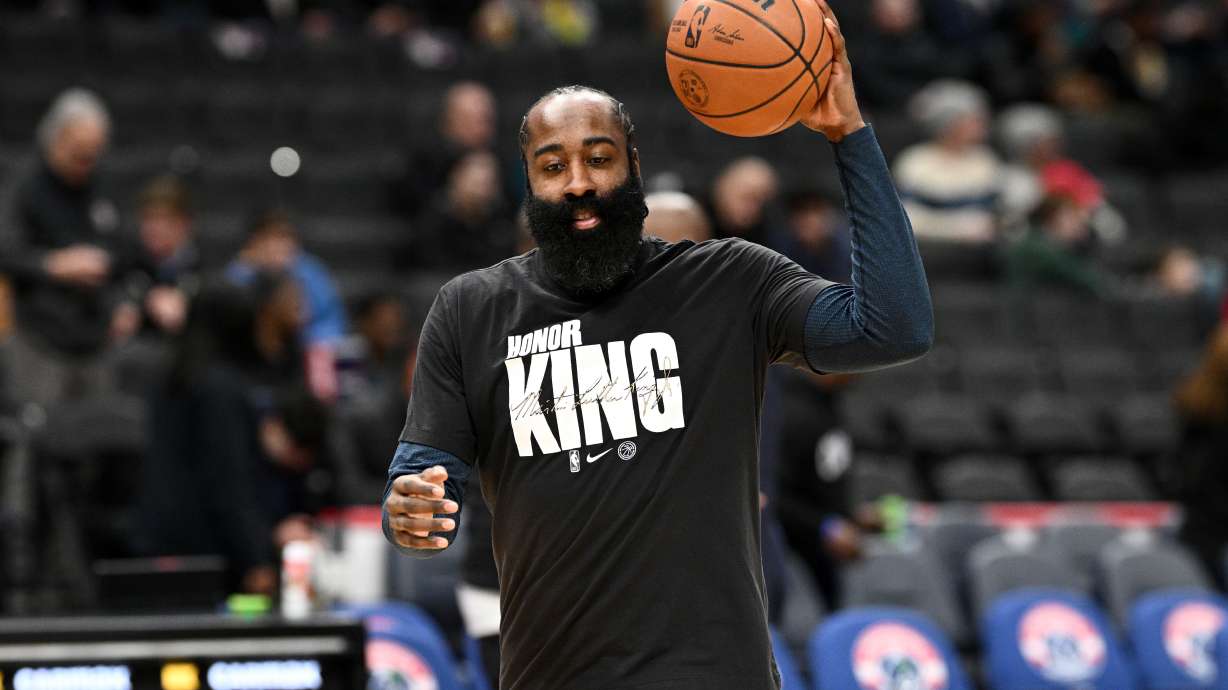 Los Angeles Clippers guard James Harden warms up while wearing a shirt paying tribute to Martin Luther King Jr. before of an NBA basketball game against the Washington Wizards, Monday, Jan. 19, 2026, in Washington.