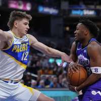 Collier posts career-high 22 assists as Jazz pick up 131-122 win over Indiana