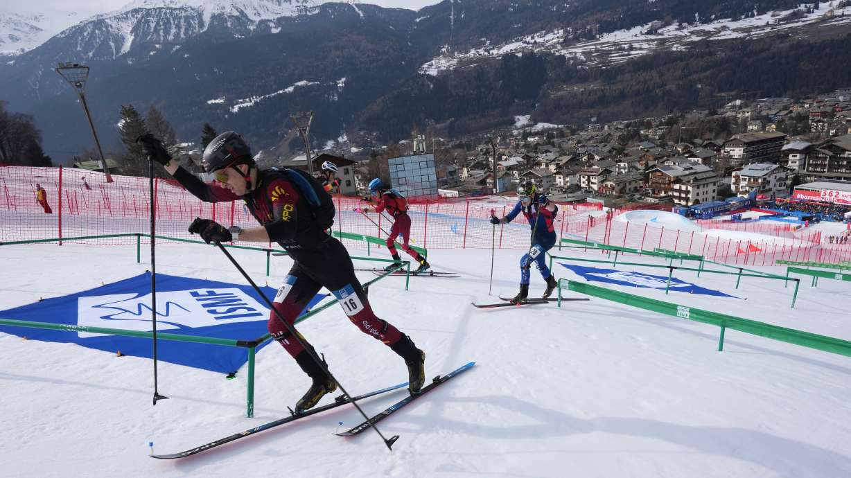 FILE - Athletes compete during the men's sprint race at the Ski Mountaineering World Cup event in Bormio, Italy, Saturday, Feb. 22, 2025.