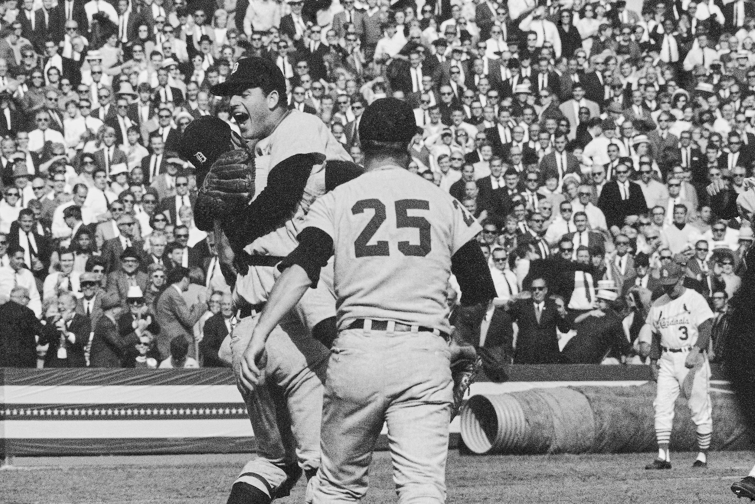 Detroit Tigers catcher Bill Freehan and pitcher Mickey Lolich off his feet as he screams with joy, after defeating the St. Louis Cardinals 4-1 in the final game of the World Series on Wednesday, Oct. 10, 1968 at Busch Stadium in St. Louis. Joining the celebration is Norm Cash (25). Lolich became the twelfth pitcher to win three games in the World Series. 