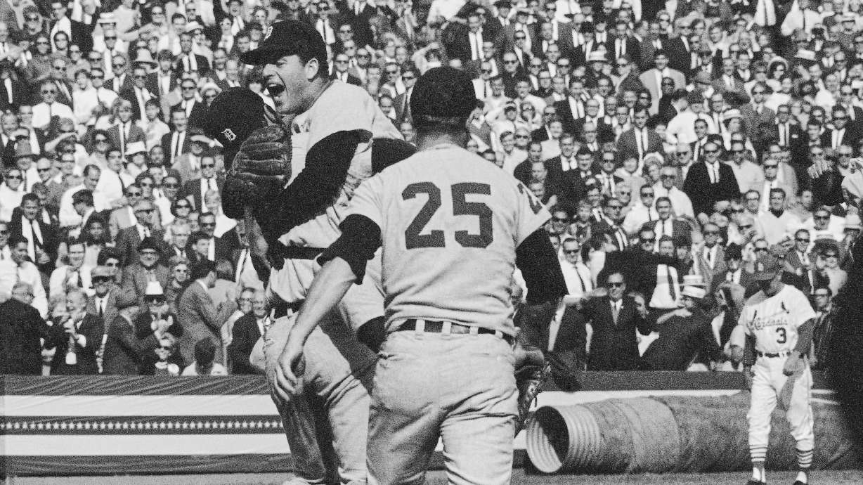 Detroit Tigers catcher Bill Freehan and pitcher Mickey Lolich off his feet as he screams with joy, after defeating the St. Louis Cardinals 4-1 in the final game of the World Series on Wednesday, Oct. 10, 1968 at Busch Stadium in St. Louis. Joining the celebration is Norm Cash (25). Lolich became the twelfth pitcher to win three games in the World Series.