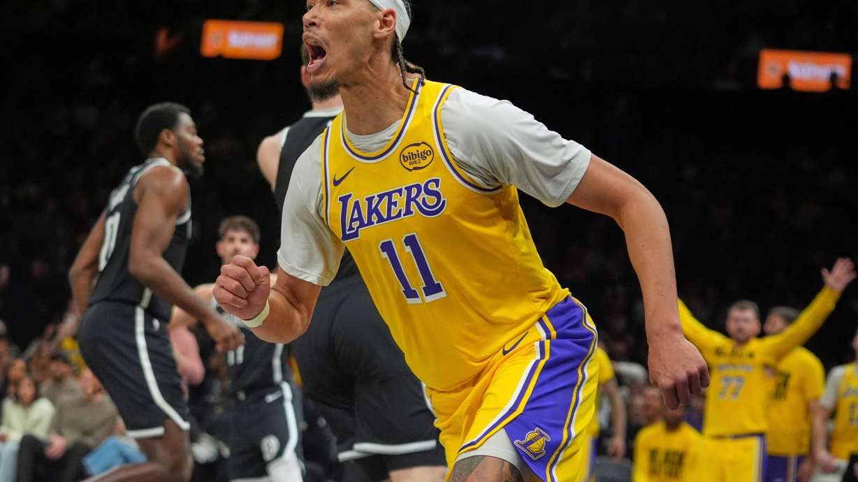 Los Angeles Lakers' Jaxson Hayes (11) celebrates after dunking during the first half of an NBA basketball game against the Brooklyn Nets Tuesday, Feb. 3, 2026, in New York.