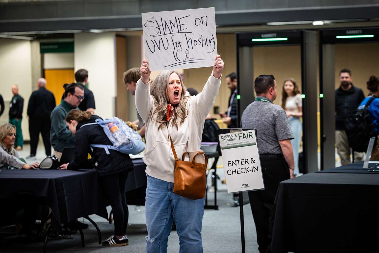 Community member Amanda Groves yells “Shame on UVU!” as UVU students participate in a sit-in against Department of Homeland Security recruitment at a job fair across from the Sorensen Center Grand Ballroom in Orem on Wednesday.