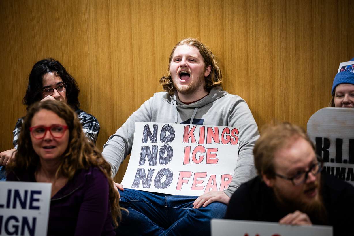 UVU students participate in a sit-in against Department of Homeland Security recruitment at a job fair across from the Sorensen Center Grand Ballroom in Orem on Wednesday.
