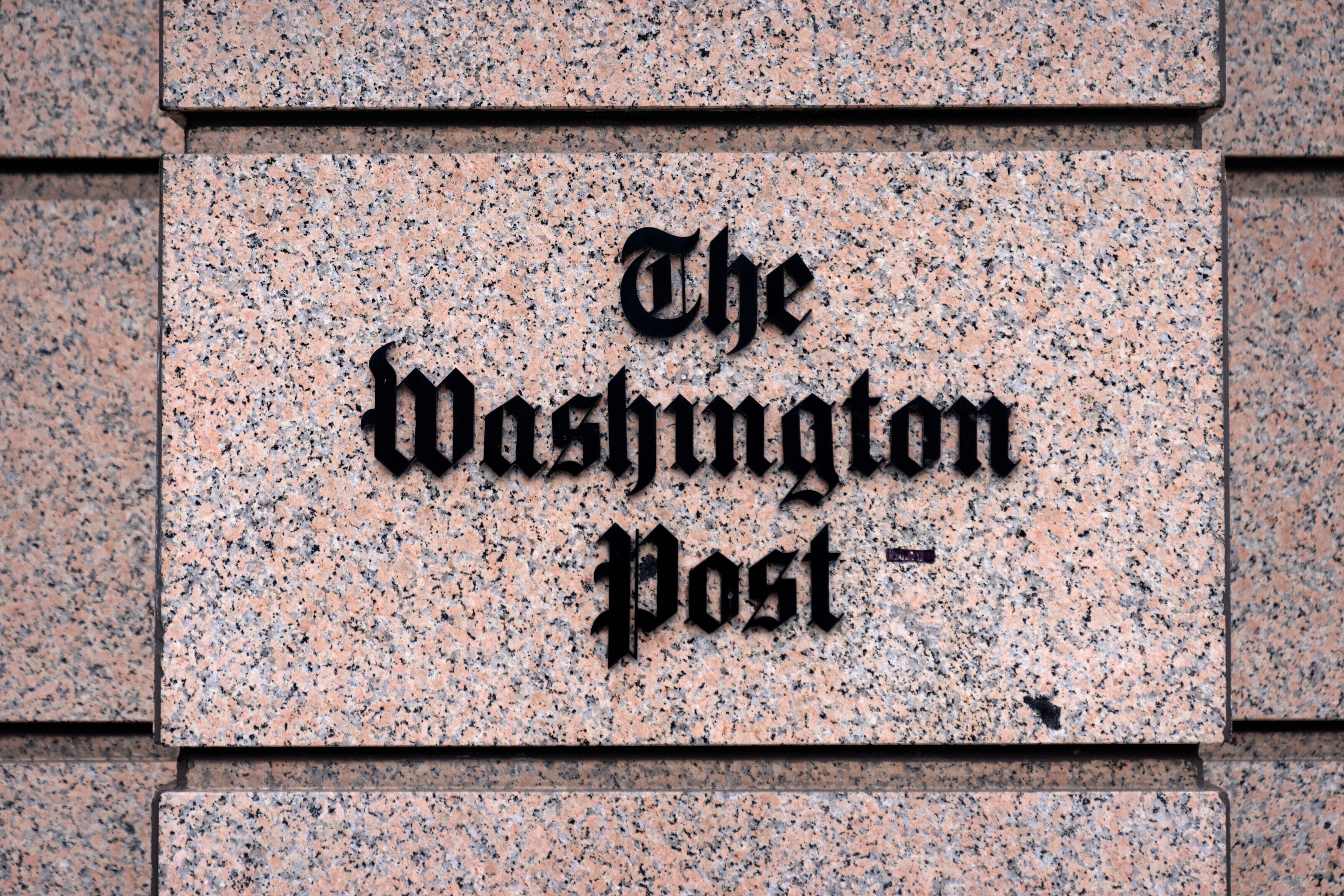 A sign for the Washington Post is seen at the company's offices, Monday, Jan. 26, 2026, in Washington. 