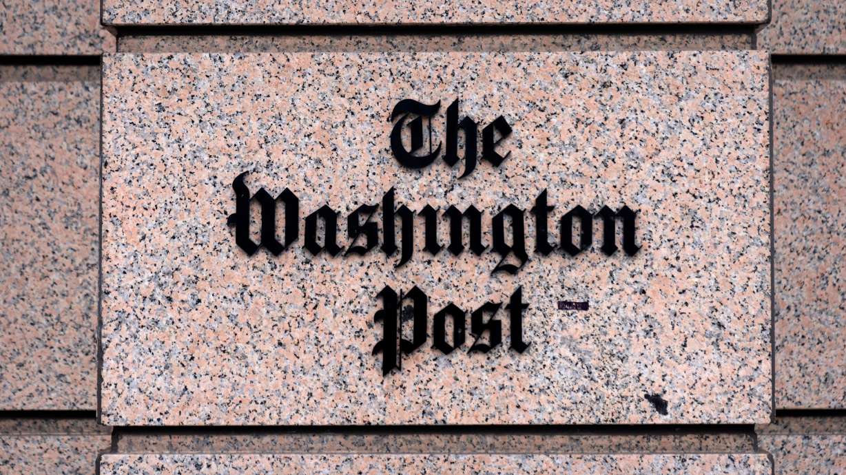 A sign for the Washington Post is seen at the company's offices, Monday, Jan. 26, 2026, in Washington.
