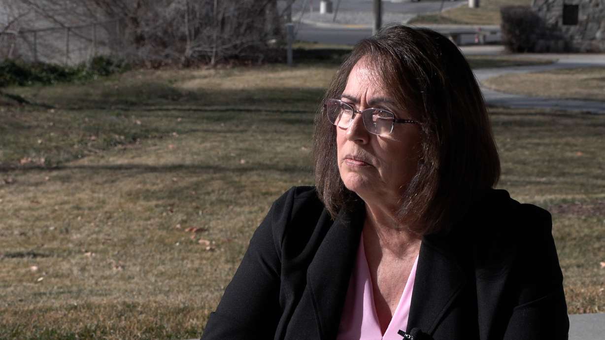 Anola Johnson speaks at a park in Centerville on Wednesday about a romance scam through which she lost $850,000. A pair of Utah bills would cap cryptocurrency transfers in an effort to crack down on similar fraud.