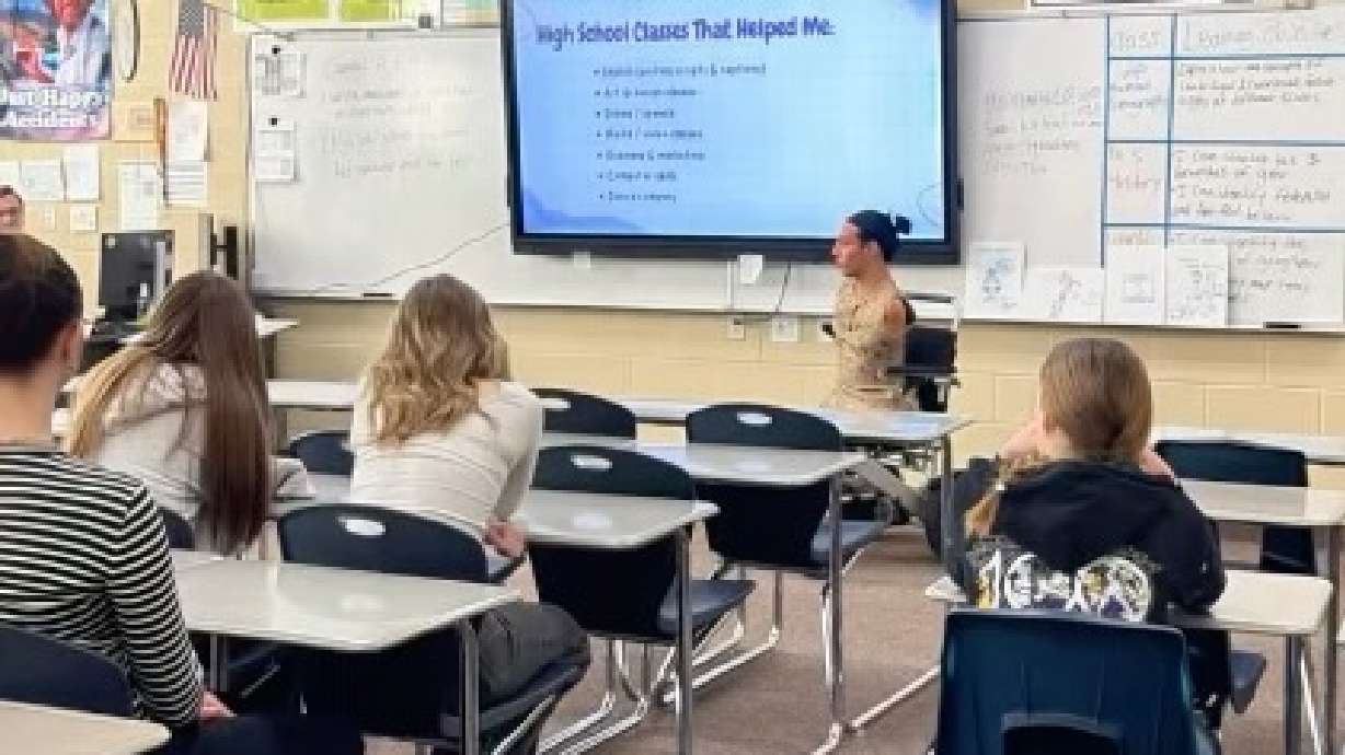 Social media influencer Briel Adams-Wheatley gives a presentation to students at a career day event at Rocky Mountain Junior High School on Jan. 29. The appearance prompted a dustup among some.