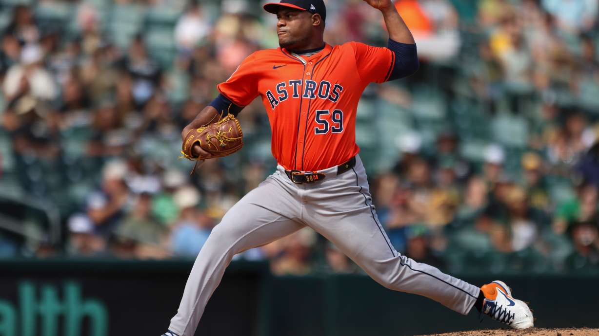 FILE - Houston Astros pitcher Framber Valdez throws to an Athletics batter during the third inning of a baseball game Sept. 25, 2025, in West Sacramento, Calif.