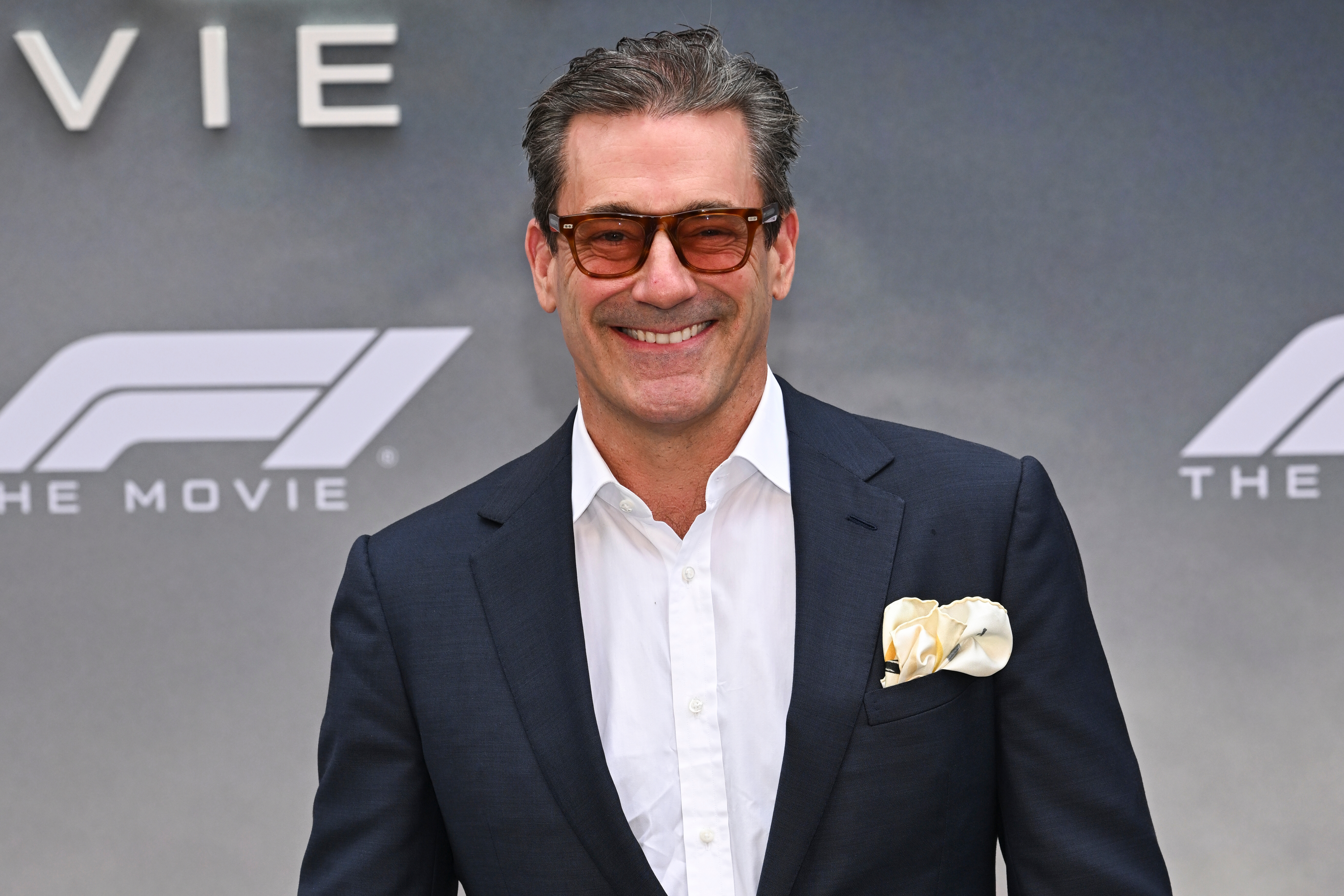 FILE - Jon Hamm attends the world premiere of "F1 The Movie" on Monday, June 16, 2025, in Times Square in New York. 