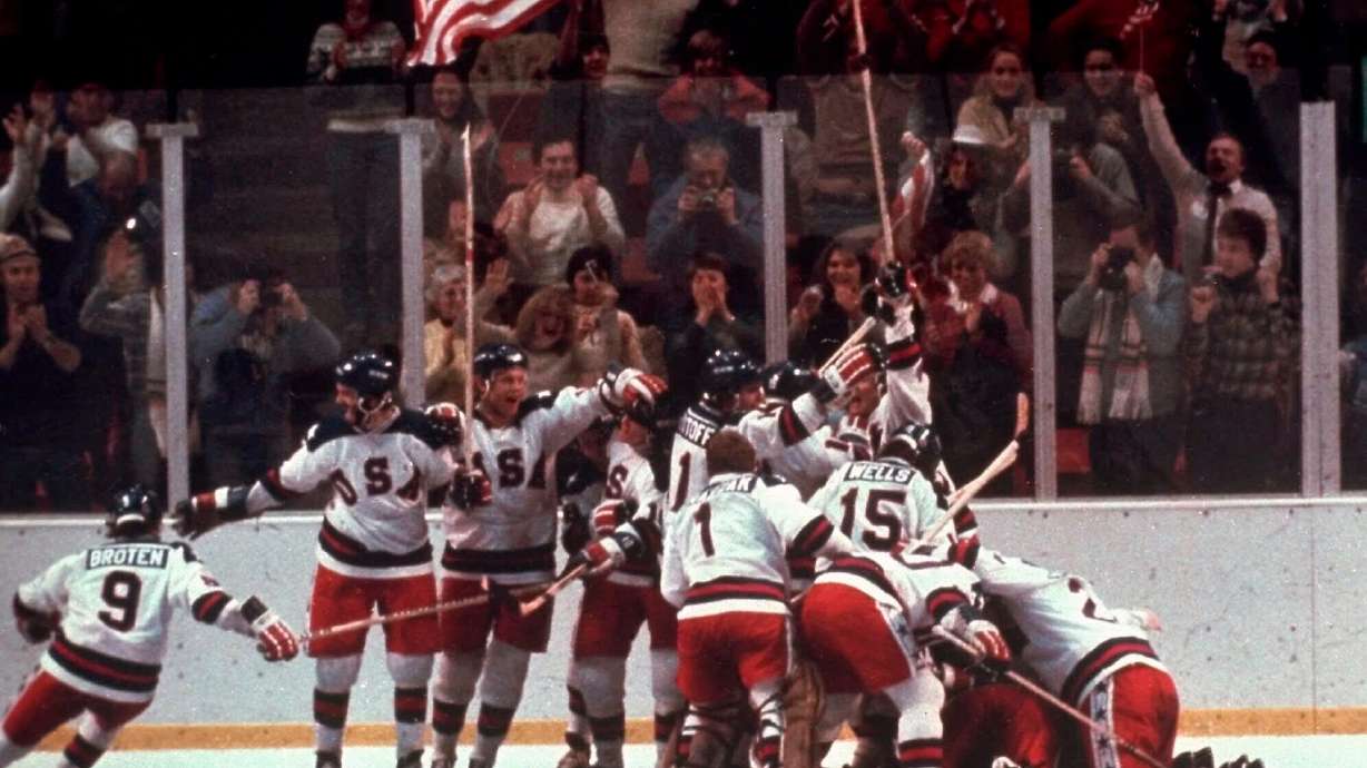 FILE - In this Feb. 22, 1980, file photo, the U.S. hockey team pounces on goalie Jim Craig after a 4-3 victory against the Soviet Union in a medal round match at the the 1980 Winter Olympics in Lake Placid, N.Y.