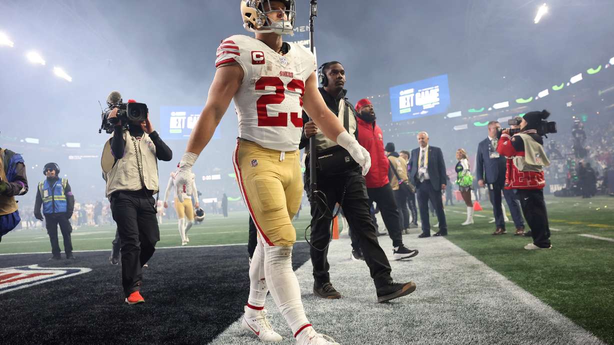 San Francisco 49ers' Christian McCaffrey walks off the field after an NFL football divisional playoff game against the Seattle Seahawks, Saturday, Jan. 17, 2026, in Seattle.