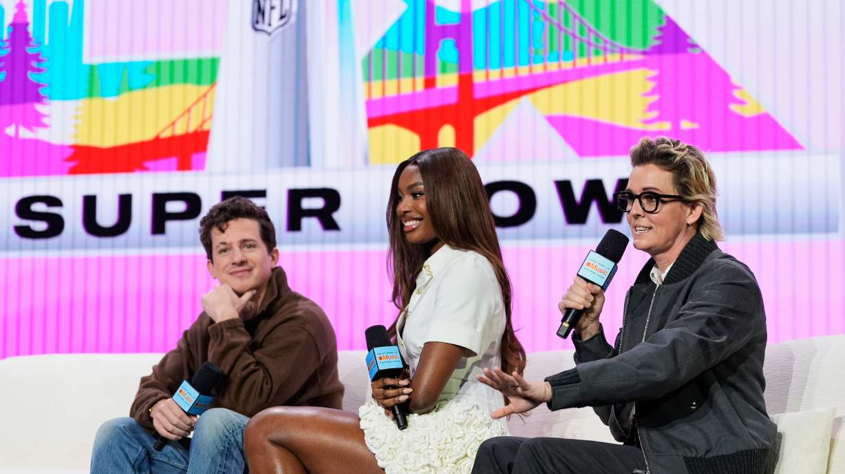 From left; Charlie Puth, Coco Jones and Brandi Carlile – who will perform the national anthem, "Lift Every Voice," and "America the Beautiful" respectively – speak during a news conference, Thursday, Feb. 5, 2026, in San Francisco ahead of the NFL Super Bowl 60 football game between the Seattle Seahawks and the New England Patriots.